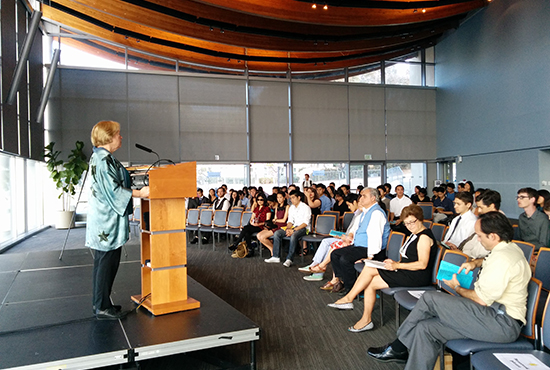Speaker addressing audience in UCSD Great Hall